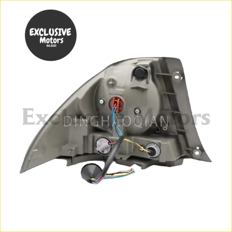 Back side of gray plastic rear tail lights x 2 for is200 2000-2004 toyota altezza with wiring and mounting hardware