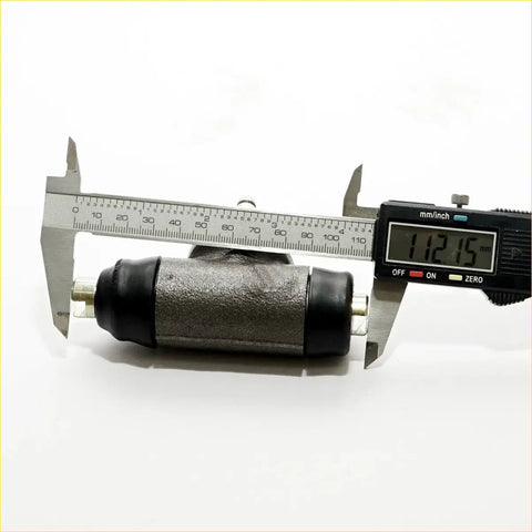 Rear wheel brake cylinder for ford ranger et es er in silver metal with black rubber end caps shown from the back side