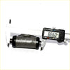 Black and silver rear wheel brake cylinder for Mitsubishi Pajero Montero sport being measured with digital caliper