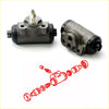 Gray metallic rear wheel brake cylinder with black rubber seals and threaded fittings for Mitsubishi Triton L200