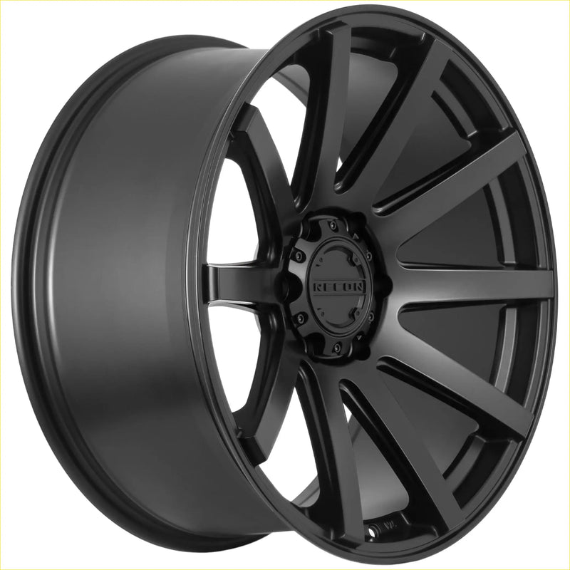 Black matte alloy wheel with multi-spoke design and kelly logo in the center for recon force matt black product