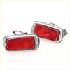 Pair of chrome-finished rectangular red tail marker lights with textured lenses and wire connectors for Nissan Datsun cars