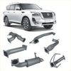 White nissan patrol suv with chrome accents and black alloy wheels shown from the back with redback extreme duty exhaust