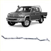 Silver metallic exhaust manifold made for toyota land cruiser 70 series shown from the back side
