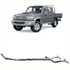 Gray metallic extreme duty twin exhaust system for Toyota Landcruiser 79 series shown from the back side