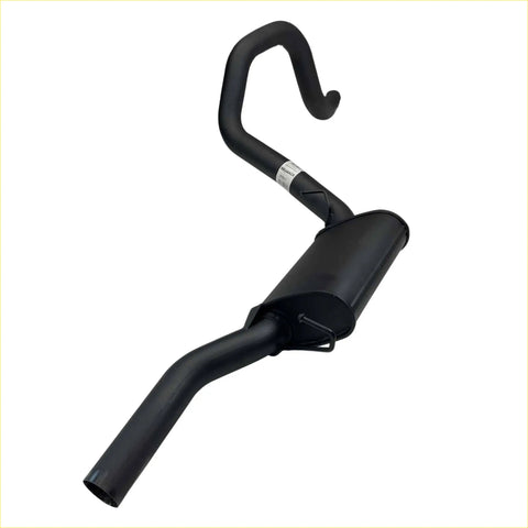 Black metal exhaust pipe with curved hook top on the back side of redback performance exhaust for ford falcon 1998