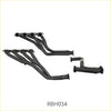 Black metal exhaust manifold set with sleek angular design and polished finish from redback performance for holden