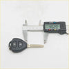 Black plastic remote key fob with two buttons and metal key blade for toyota hilux mk6 sr5 2004-2011