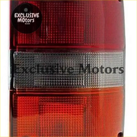 Right-hand tail light for Nissan Patrol 1988-1994 with red and clear plastic and textured grid pattern on the back side