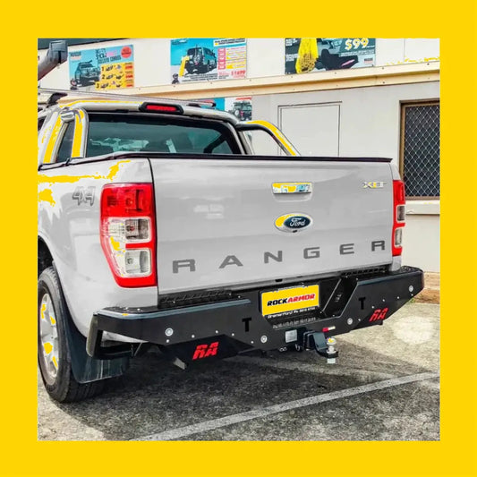 Black rockamor elite steel rear step bumper with red branding on silver ford ranger xlt wildtrak 2012-2020 back side