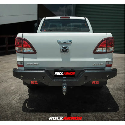White Mazda pickup truck with aftermarket rear step tow bar for Mazda BT50 2011-2020