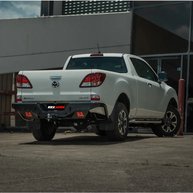 White Mazda BT-50 pickup truck with Rockamor Elite Steel Rear Step Towbar