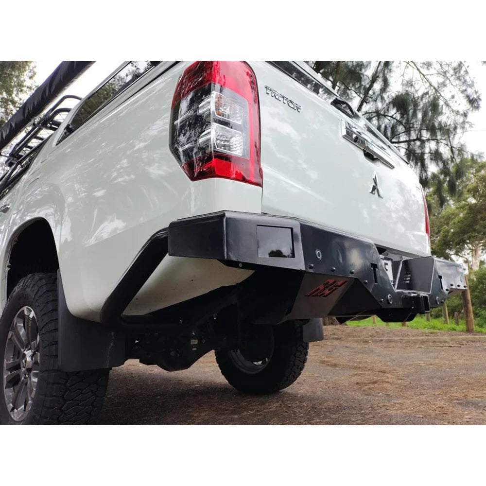 White pickup truck with black aftermarket bumper and rear step tow for Mitsubishi MR Triton