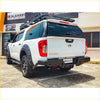 White nissan navara ute with black rugged steel rockamor elite rear step towbar for offroad 4wd use back view