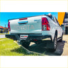 Black rockarmor elite steel rear step bumper with towbar on white toyota hilux sr5 rear side for 4wd ute offroad use