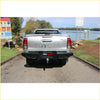 Back view of silver toyota hilux ute with black rockamor elite steel rear step towbar for offroad 4wd use