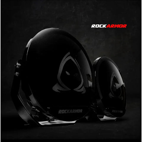 Black rockarmor glossy motorcycle helmet with white logo paired with steel bullbar combo for 4wd ute offroad use