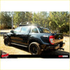 Black ford ranger ute with rugged offroad tires and roof rack featuring rockarmor brushbar for 4wd use