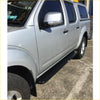 Black textured rockarmor side step for silver nissan navara d40 4wd ute offroad 2005 to 2015 model