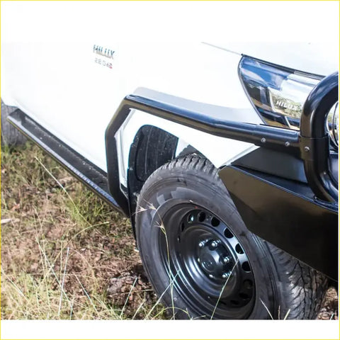 Black tubular steel rockarmor brushbar on white toyota hilux ute 4wd for offroad protection 2015-2020