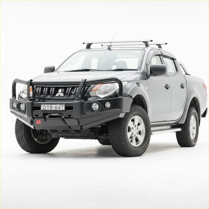 Silver mitsubishi triton mq pickup with black rockarmor elite steel bullbar front bumper guard and roof rack