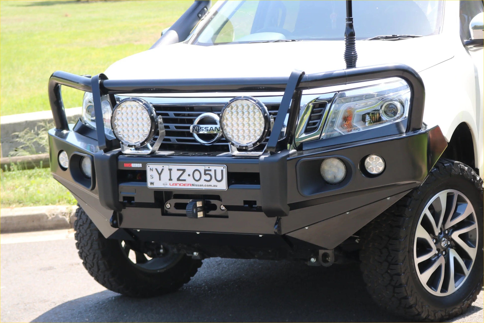 Black metal rockarmor elite steel bullbar with two circular led lights for nissan navara np300 d23 front bumper guard