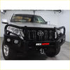 Black rockarmor elite steel bullbar with integrated lights and winch hook on silver toyota ute for offroad 4wd use