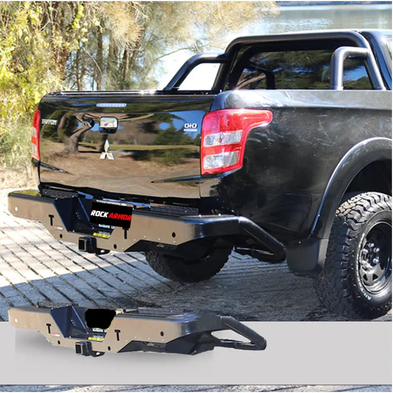 Black Mitsubishi Triton MQ with aftermarket rear step tow bar for enhanced utility