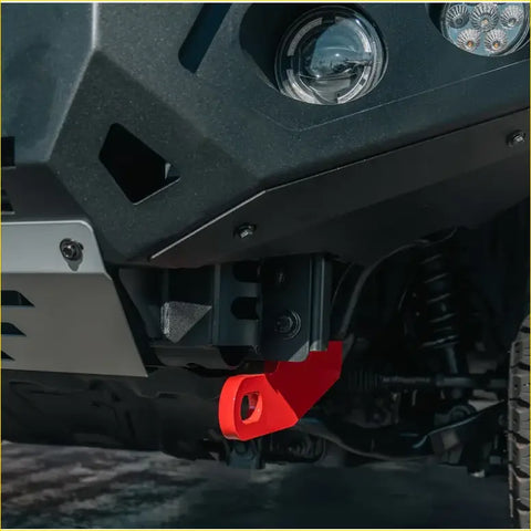 Bright red angular metal recovery hook on front bumper of rockarmor gt hoop bullbar combo pack for 4wd ute offroad