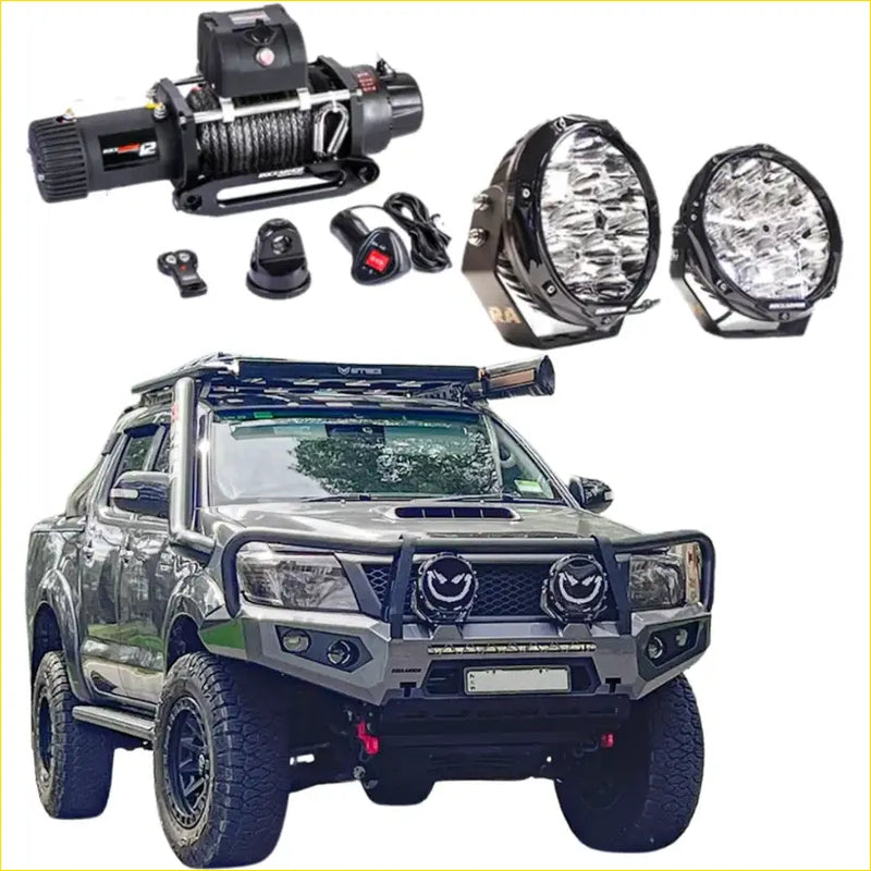 Black and silver offroad 4wd ute with rockarmor gt hoop bullbar combo pack roof rack and led lights on toyota hilux n70