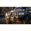 Black nissan patrol with rugged matte rockarmor gt hoop bullbar combo featuring smiley face lights and orange recovery points ideal for 4wd offroad ute