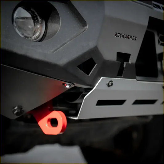 Bright red plastic recovery loop attached to rugged gray steel rockarmor gt hoop bullbar for landcruiser 100 series