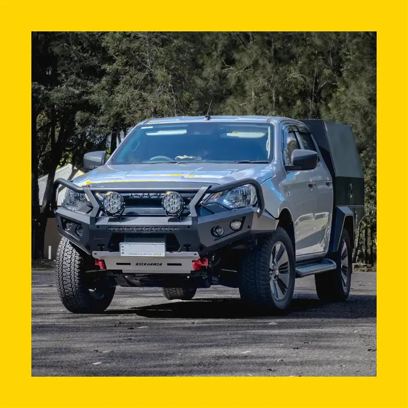 Silver and black steel rockarmor gt hoop bullbar on isuzu dmax 2024 with rugged front bumper and custom canopy