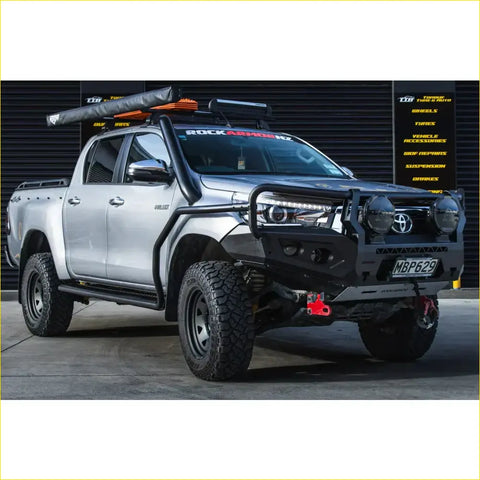 Silver toyota hilux ute with rockarmor gt hoop steel bullbar and rugged tires built for offroad 4wd use