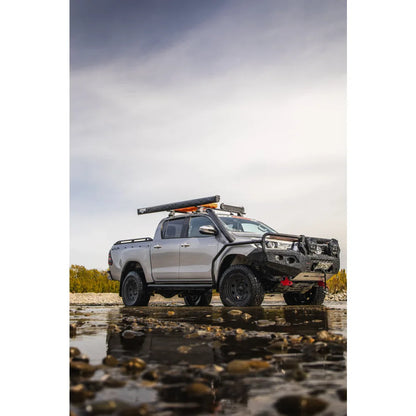 Silver off-road pickup truck with Rockarmor GT Hoop Steel Bullbar on Toyota Hilux N80