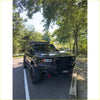 Black rugged steel rockarmor gt hoop bullbar with roof rack and front bumper guard on toyota prado 250 2024