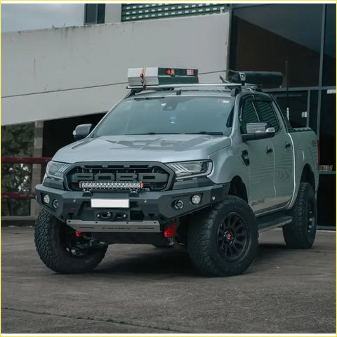 Silver ford ranger ute with black offroad tires and rockarmor gt hoopless steel bullbar for 4wd use