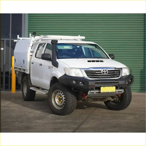 White toyota hilux with a black rockarmor gt hoopless steel bullbar full bar replacement and roof rack