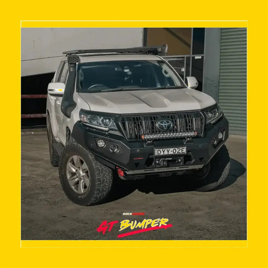 Black rugged steel rockarmor gt hoopless bullbar with led light bar and winch mount on white toyota prado