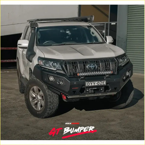 White toyota land cruiser prado with black rockarmor gt hoopless steel bullbar and roof rack for offroad 4wd use
