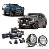 Black rugged winch with coiled steel cable and remote in rockarmor gt steel hoop bullbar combo pack for ford everest 4wd ute offroad