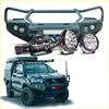 Black rugged steel front bumper with integrated lights and winch for offroad 4wd ute toyota hilux 2020-2025
