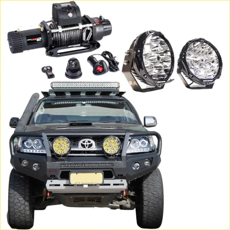 Black Toyota Tacoma with rugged steel Rockarmor GT bullbar combo pack for tough 4wd offroad ute adventures