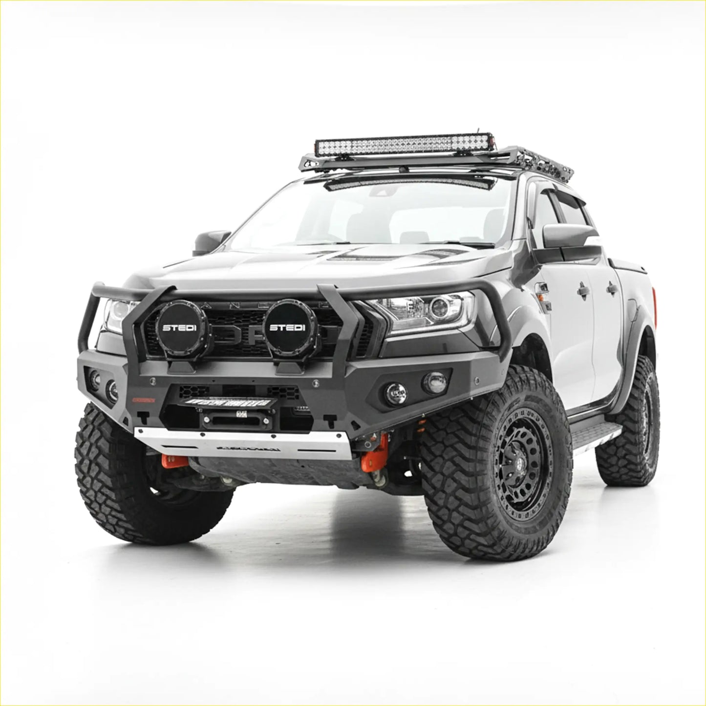 White ford ranger with black steel rockarmor gt hoop bullbar and roof light bar for off-road use