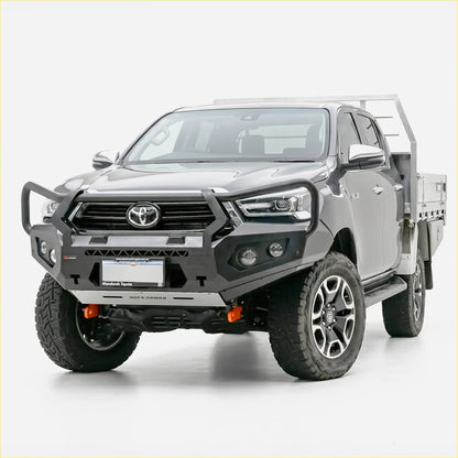 Gray toyota hilux with black and silver rockarmor gt steel hoop bullbar rugged off-road tires and alloy wheels