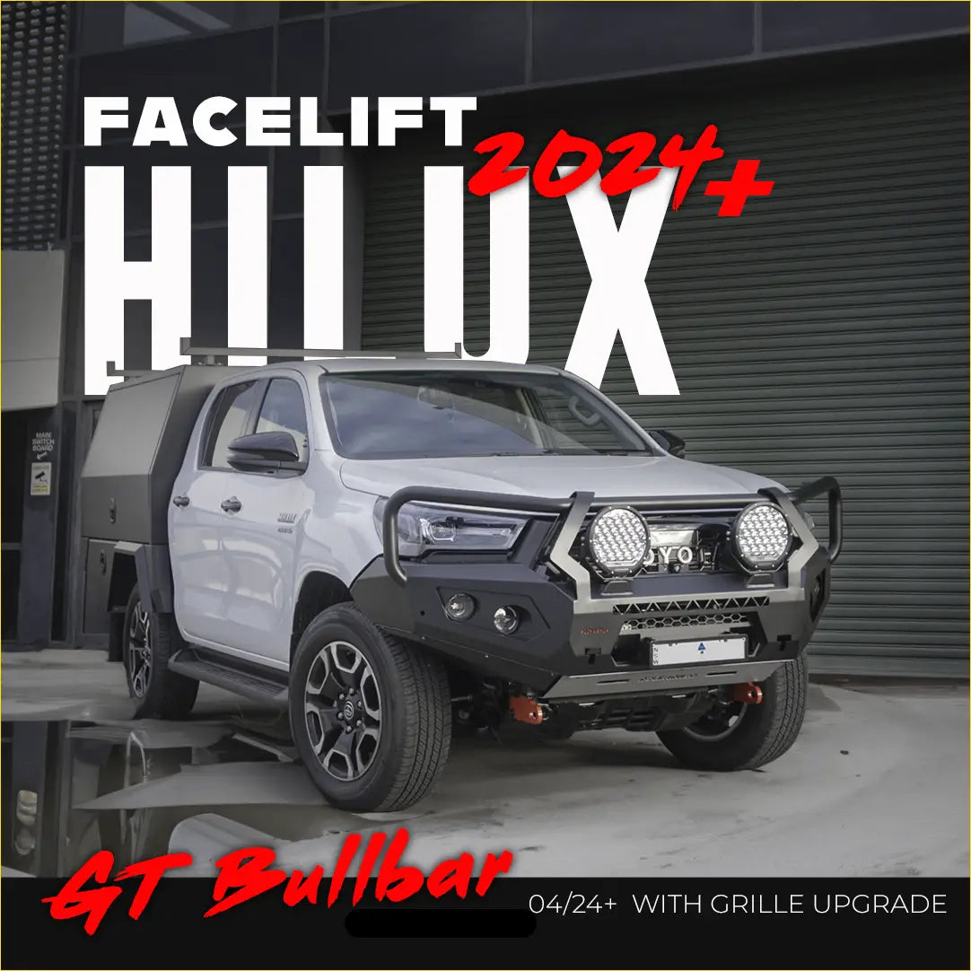 Silver 2024 toyota hilux with black rockarmor gt steel hoop bullbar and upgraded grille front bumper