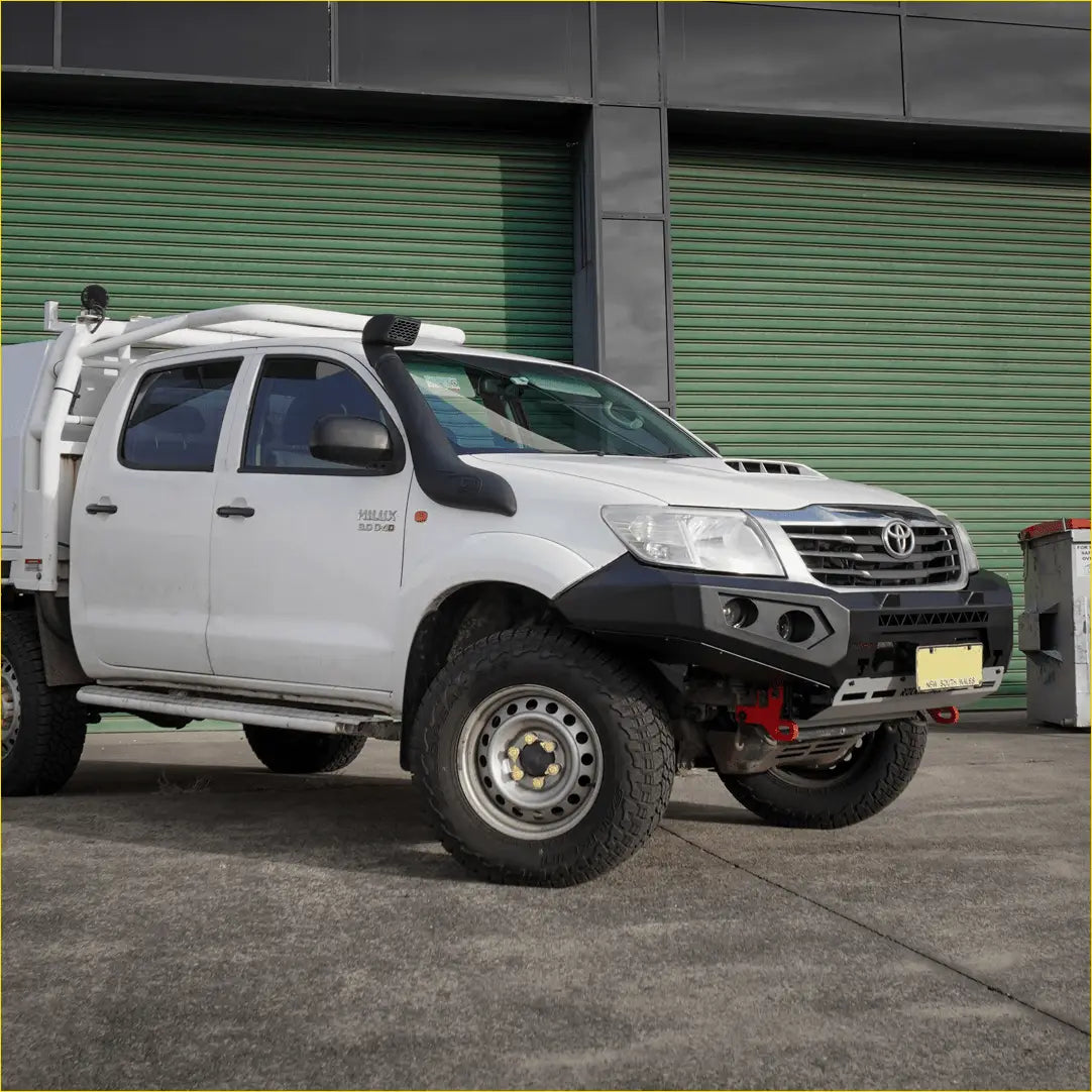 White toyota hilux with black steel rockarmor gt hoop bullbar and roof rack for 2007-15 model
