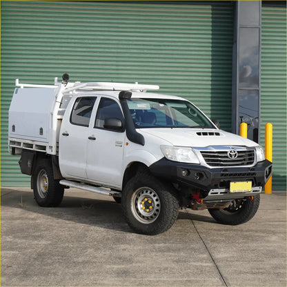 White toyota hilux with custom white cargo box and black rockarmor gt steel hoop bullbar steel bullbar