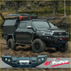 Black Toyota Hilux ute with rugged offroad 4wd setup featuring Rockarmor GT steel hoopless bullbar combo pack