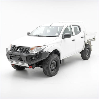 White Mitsubishi Triton with black steel Rockarmor GT hoopless bullbar and off-road tires on rugged terrain